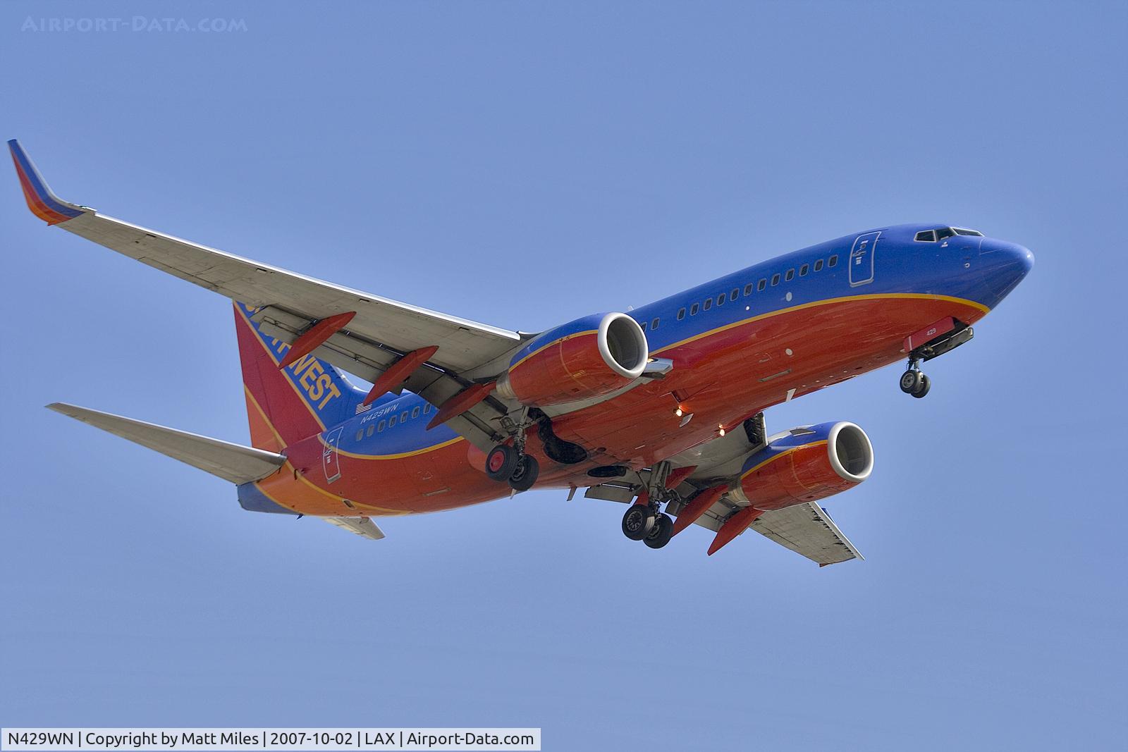 N429WN, 2002 Boeing 737-7H4 C/N 33658, Short final for 25R at LAX