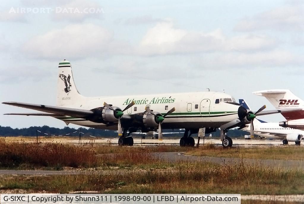G-SIXC, 1958 Douglas DC-6B C/N 45550, Parked at the Cargo apron