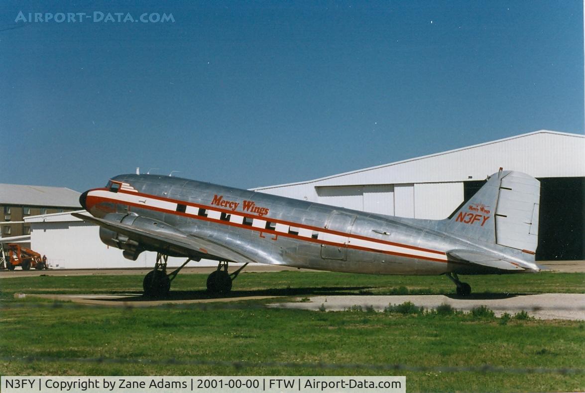 N3FY, Douglas DC3C C/N 20562, At the prop shop - Mecham Field