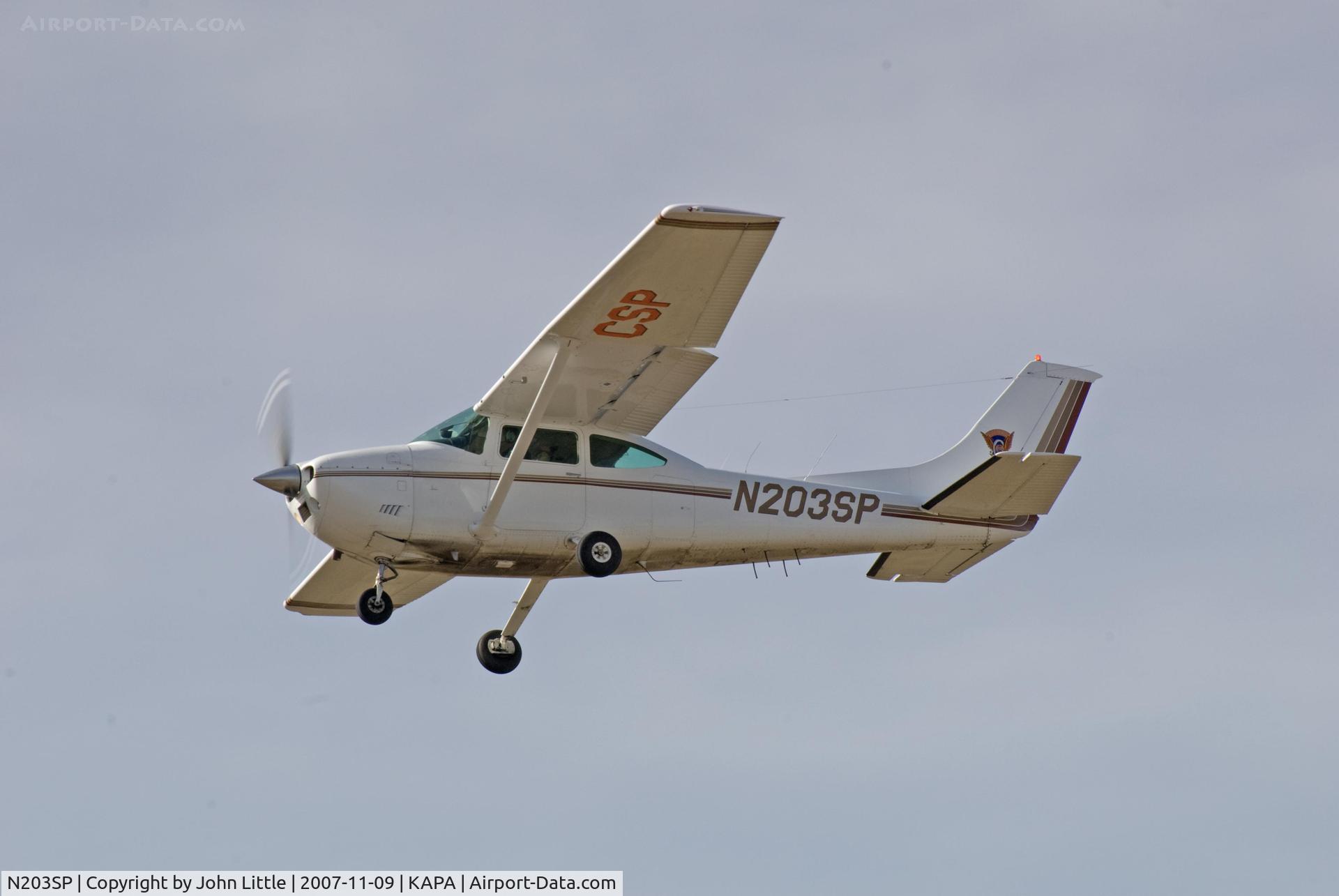 N203SP, 1980 Cessna 182Q Skylane C/N 18267546, Colorado State Patrol filght on approach over the fence to 17L