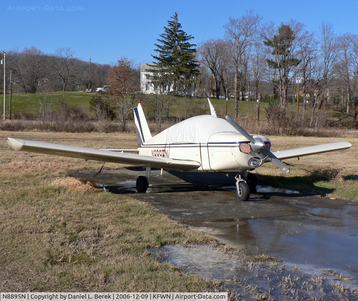 N8895N, 1969 Piper PA-28-140 C/N 28-25759, A 1969-vingage Chrokee 140 huddles under a blanket on a chilly December evening.