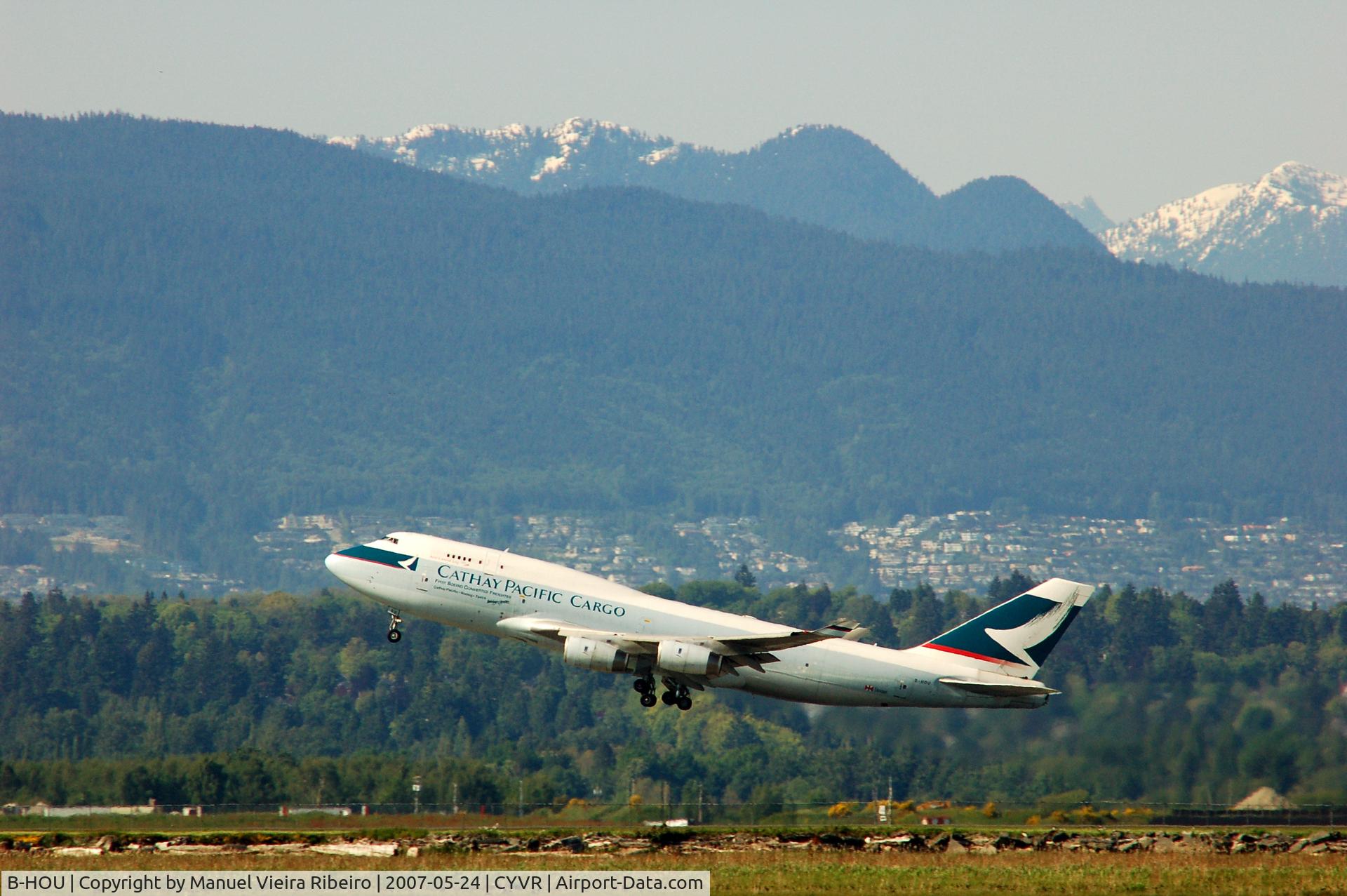 B-HOU, 1991 Boeing 747-467/BCF C/N 24925, Caption under Cathay Pacific Cargo reads:First Boeing Converted Freighter  /Cathay Pacific Boeing Taeco