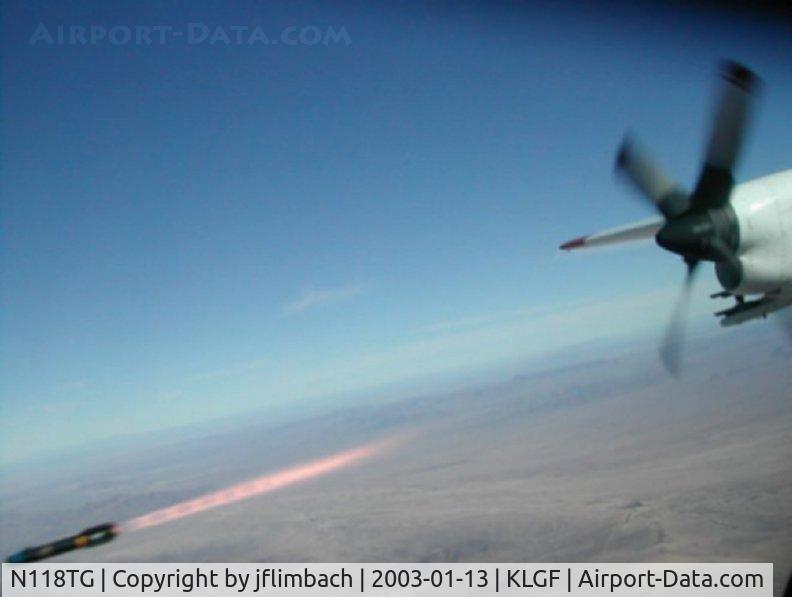 N118TG, 1957 Lockheed C-130A Hercules C/N 182-3219, N118TG fires Hellfire II missile on Killer Herc demonstration project