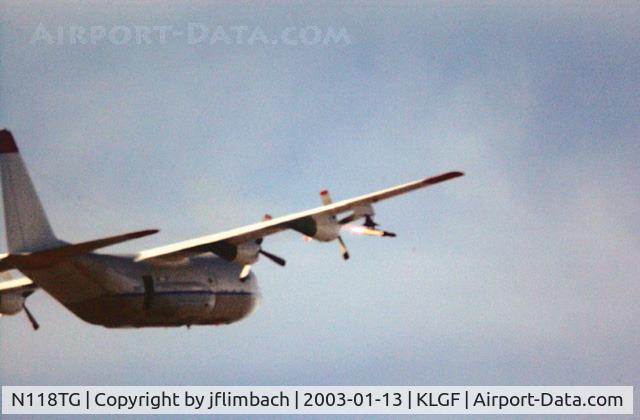 N118TG, 1957 Lockheed C-130A Hercules C/N 182-3219, Hellfire II missile launch shot from chase helicopter