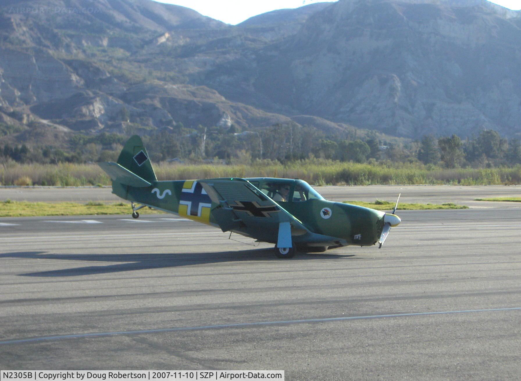 N2305B, 1948 Temco GC-1B Swift C/N 3605, 1948 TEMCO GC-1B SWIFT in WWII German camouflage livery, Continental C-125 125 Hp, left gear collapse on taxi turn from landing Rwy 22 with laminated wood prop strike under power, probable flap damage