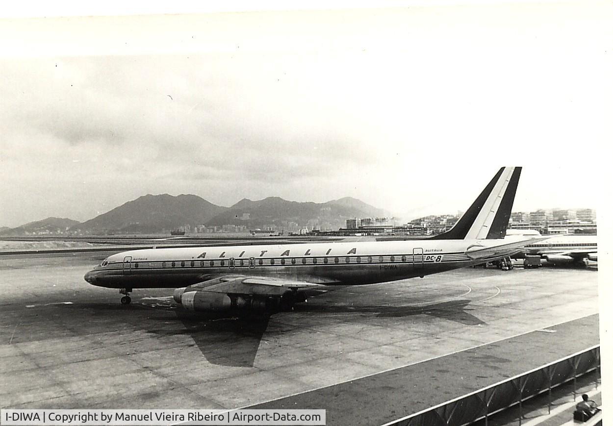 I-DIWA, 1960 Douglas DC-8-42 C/N 45598, awaiting OK signal to taxi out for departure,HKG Kai Tak airport,May 1967