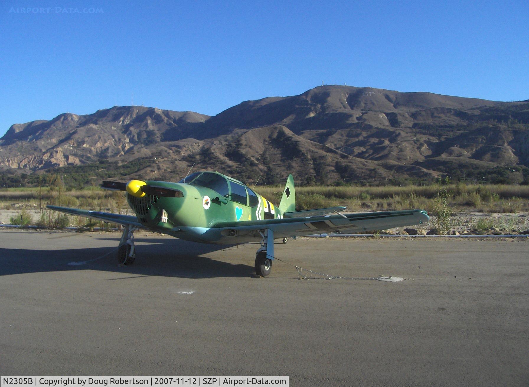 N2305B, 1948 Temco GC-1B Swift C/N 3605, 1948 TEMCO GC-1B SWIFT in WWII German camouflage livery, Continental C-125 125 Hp, left gear collapse on taxi turn from landing Rwy 22 with laminated wood prop strike under power