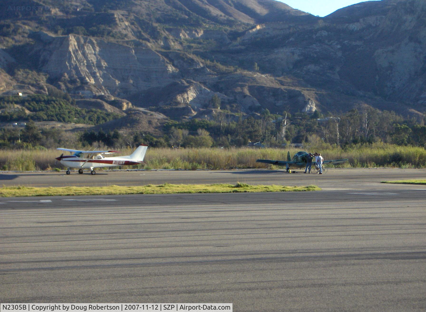 N2305B, 1948 Temco GC-1B Swift C/N 3605, 1948 TEMCO GC-1B SWIFT, Continental C-125 125 Hp, left gear collapse on taxi turn from landing Rwy 22 with laminated wood prop strike under power. fly-in damage assessment team