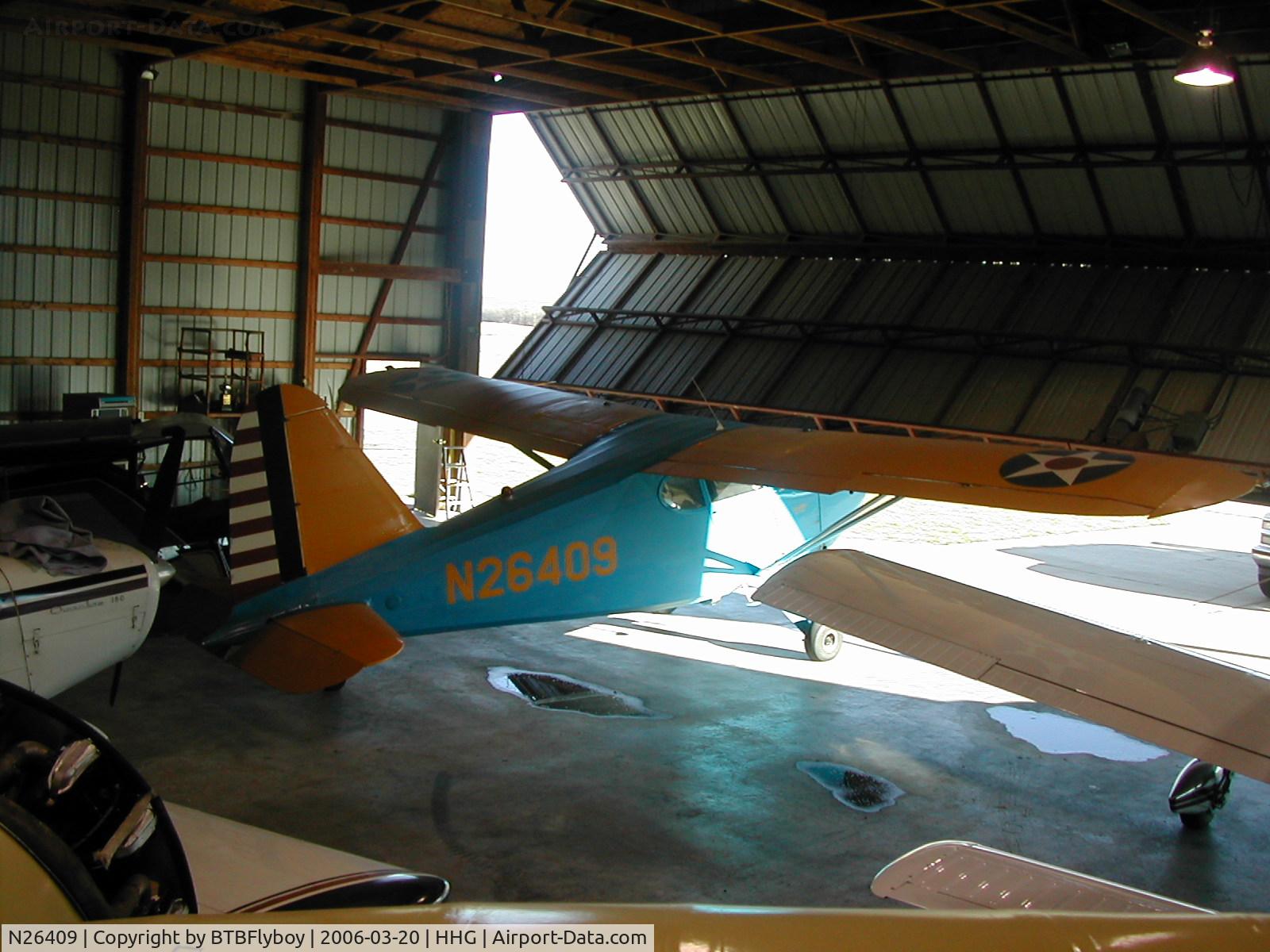 N26409, 1940 Stinson 10 C/N 7600, Hiding in a hangar at Huntington, IN