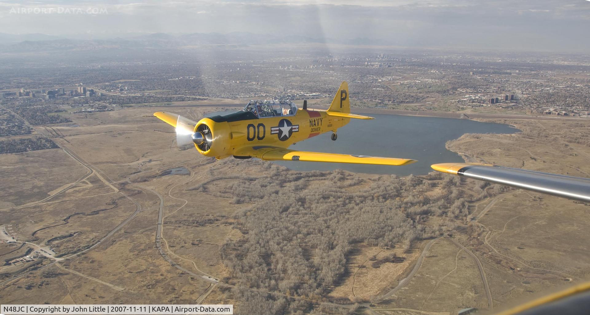 N48JC, North American AT-6G Texan Texan C/N 121-43192, Jack with beautiful Cherry Creek Resevoir in the background
