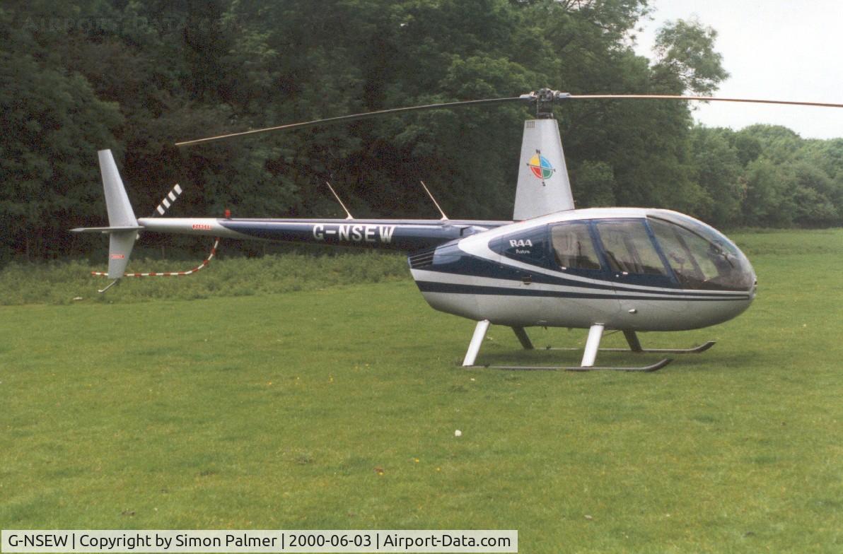 G-NSEW, 1999 Robinson R44 C/N 0615, R44 seen at Finmere