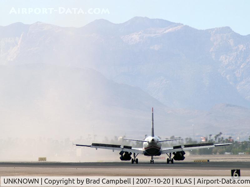 UNKNOWN, Airliners Various C/N Unknown, US Airways landing in the dust cloud of G-VROY.