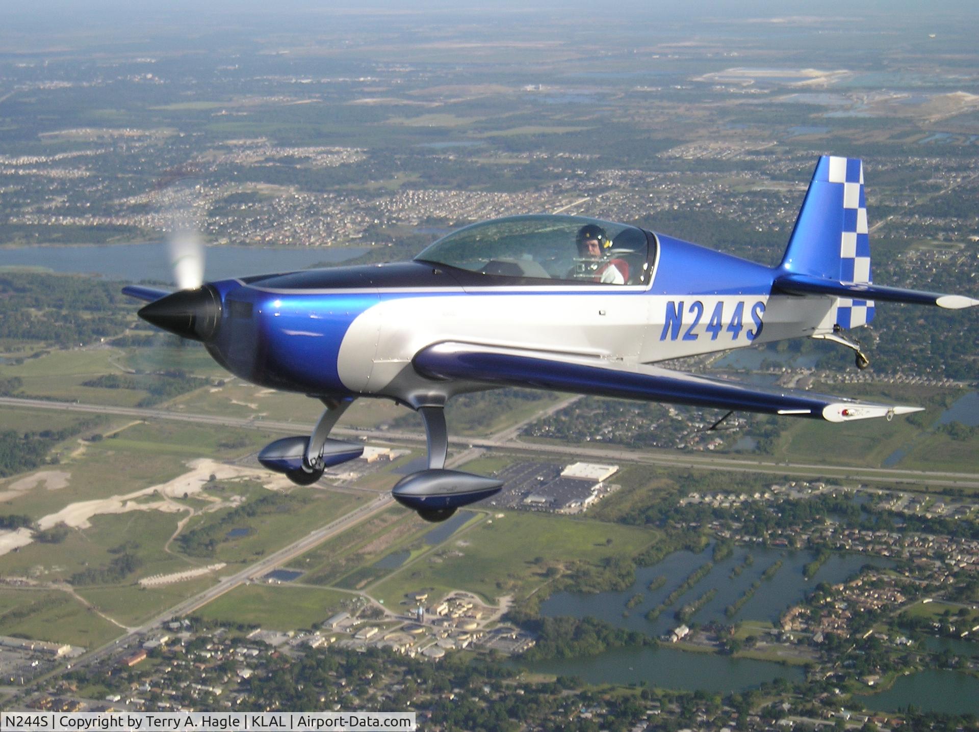 N244S, 2006 Extra EA-300/L C/N 1244, Just after takeoff from LAL - join up on Dad(32CD)