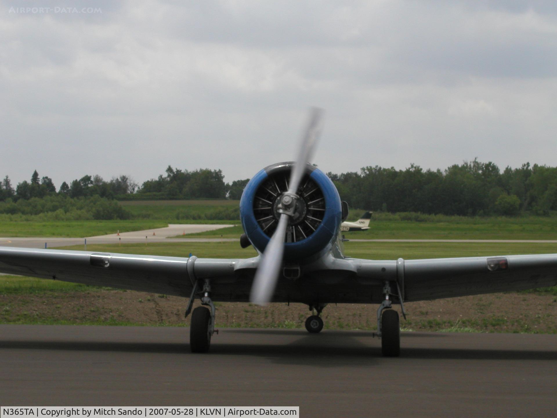 N365TA, 1951 North American T-6G Texan C/N 168-479, Starting up on the ramp.