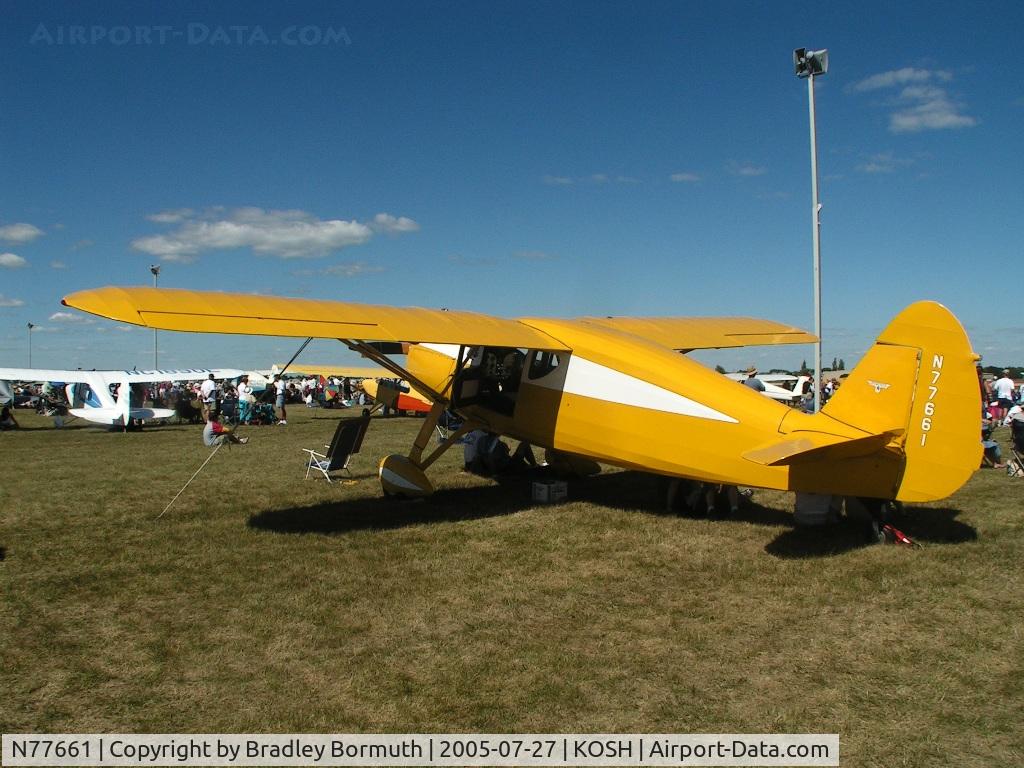 N77661, 1947 Fairchild 24R-46 C/N R46-361, Always like to see a Fairchild 24 up at Oshkosh and a fine example this one is.  This one has won many awards and I must say it is very deserving.
