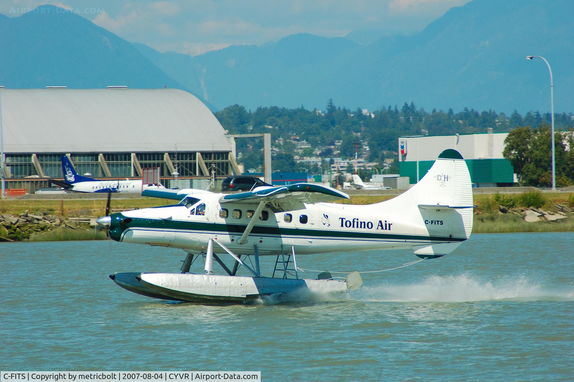C-FITS, 1956 De Havilland Canada DHC-3 Otter C/N 90, landing at the YVR seaplane facility.