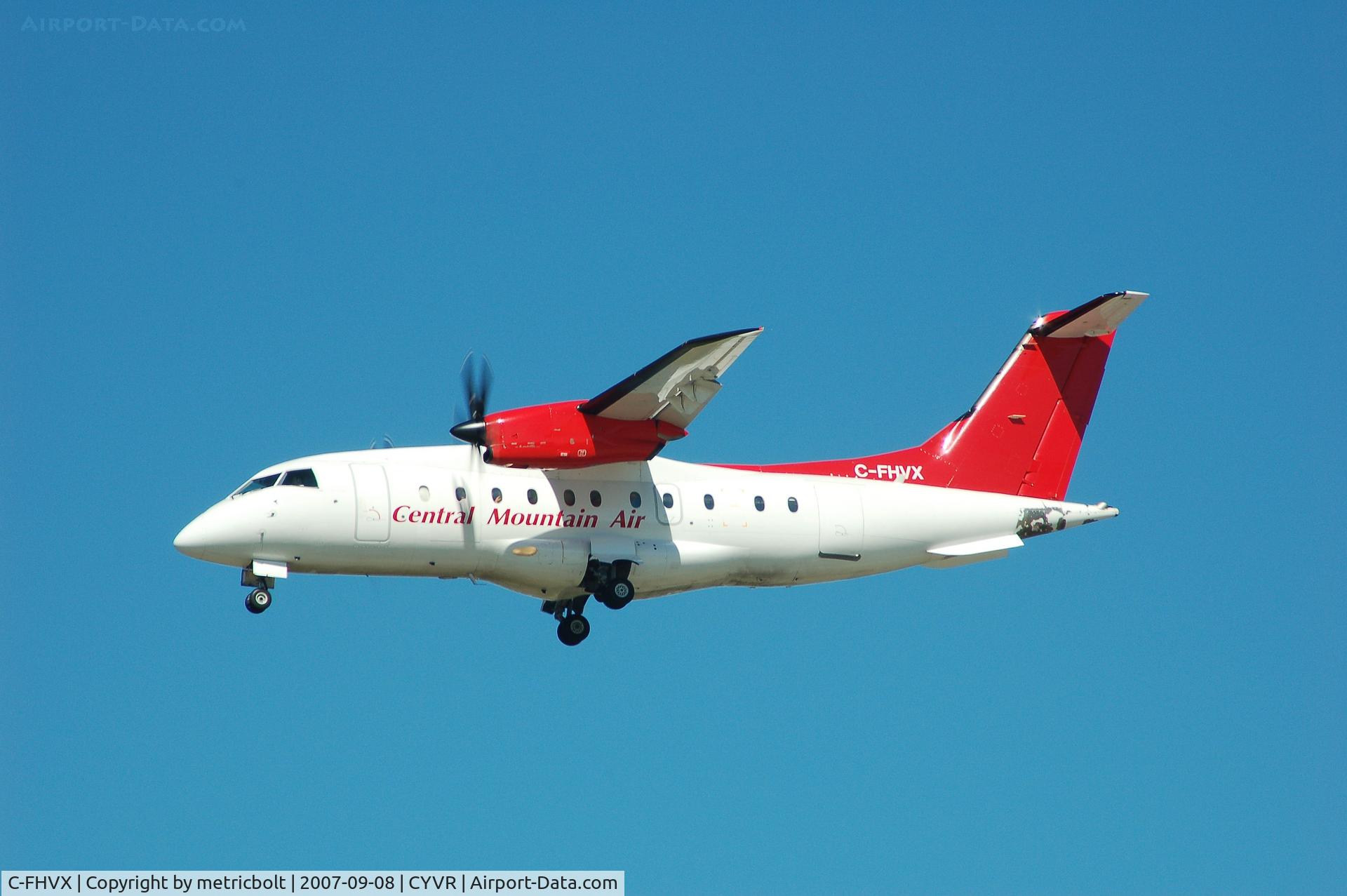 C-FHVX, 1998 Dornier 328-100 C/N 3094, landing at YVR
