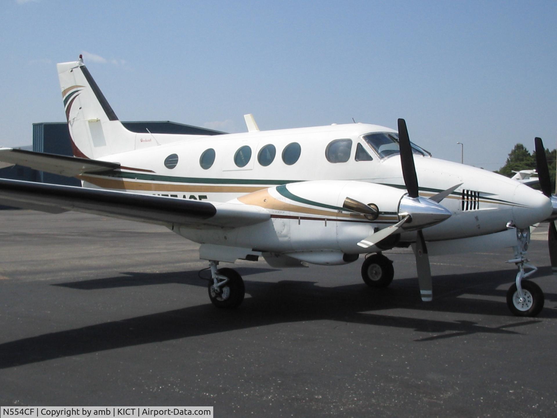 N554CF, 1973 Beech E-90 King Air C/N LW-66, N554CF on ramp at Beech/Hawker ICT