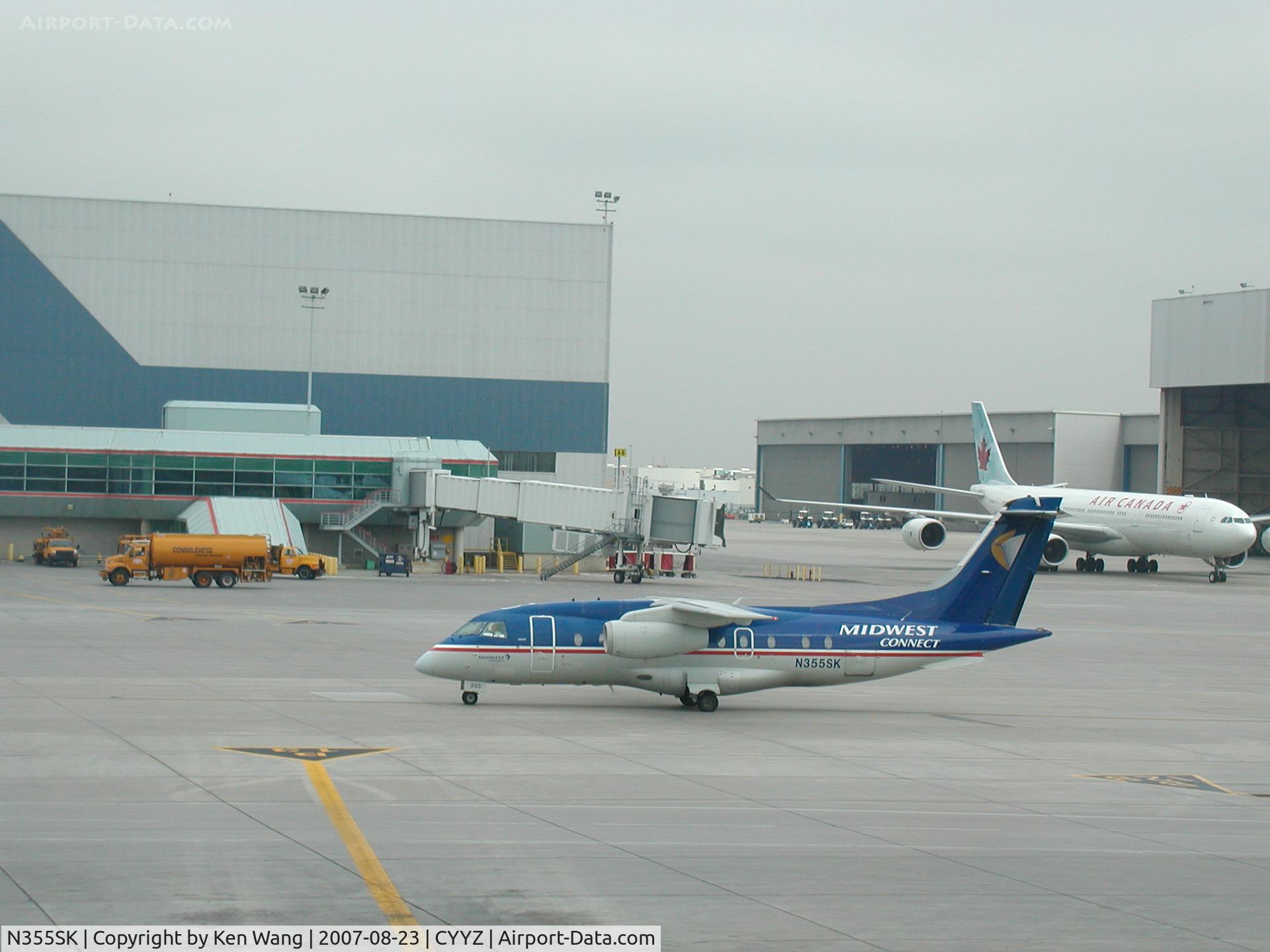 N355SK, 1999 Fairchild Dornier 328-300 328JET C/N 3124, Midwest Dornier 328 taxiing at Toronto Pearson Airport