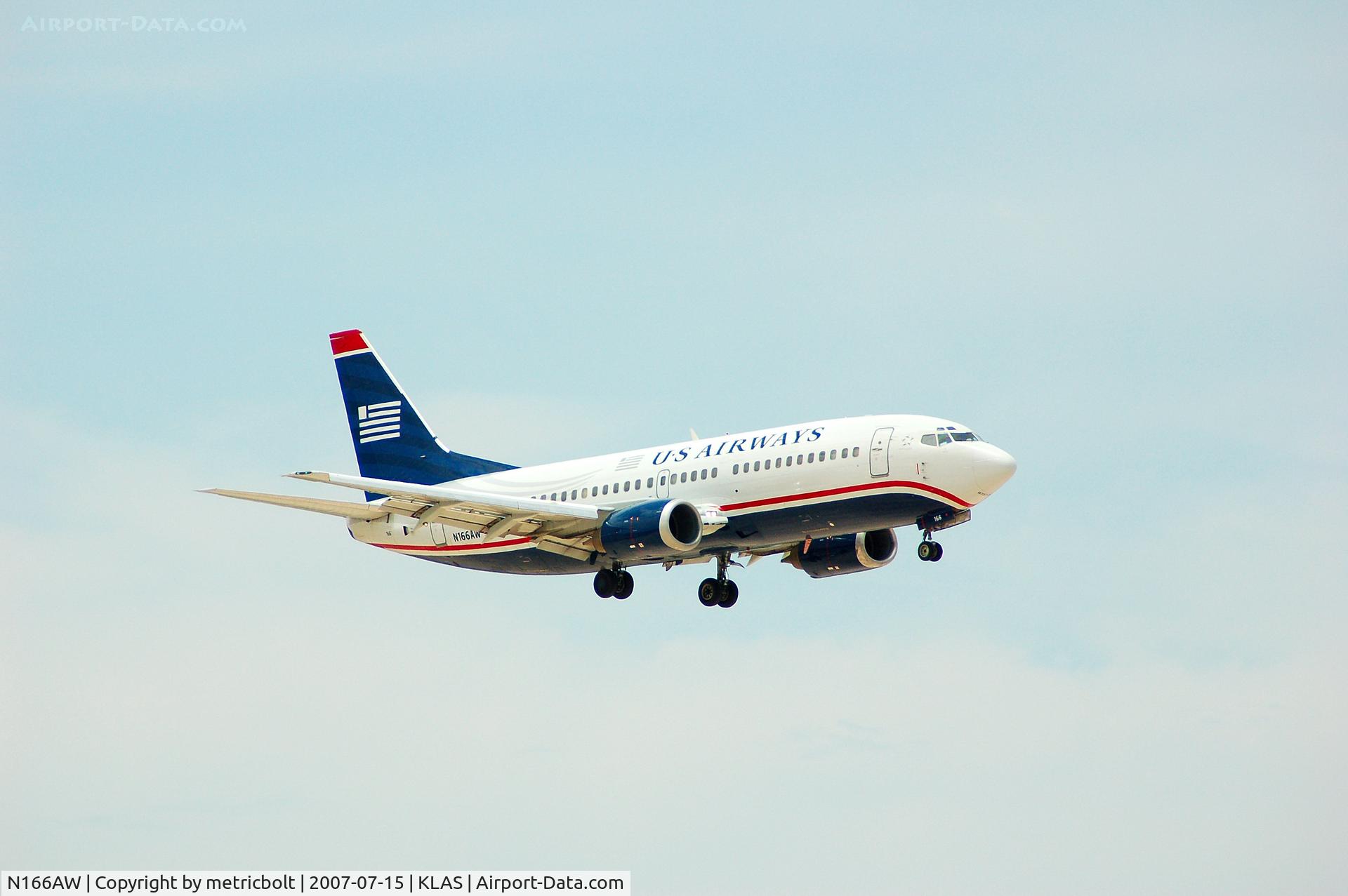 N166AW, 1986 Boeing 737-33A C/N 23627, landing at LAS