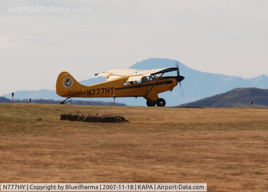 N777HY, 2007 Aviat A-1B Husky C/N 2387, Huskie position and hold. Pikes peak in the distance.