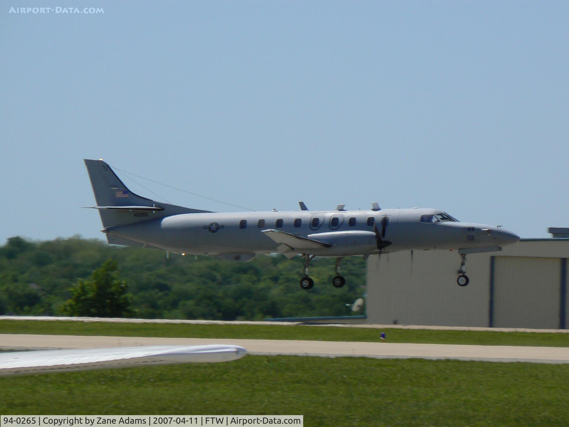 94-0265, 1994 Fairchild RC-26B Condor C/N DC-863B, Landing at Meacham Field (ATK on field)