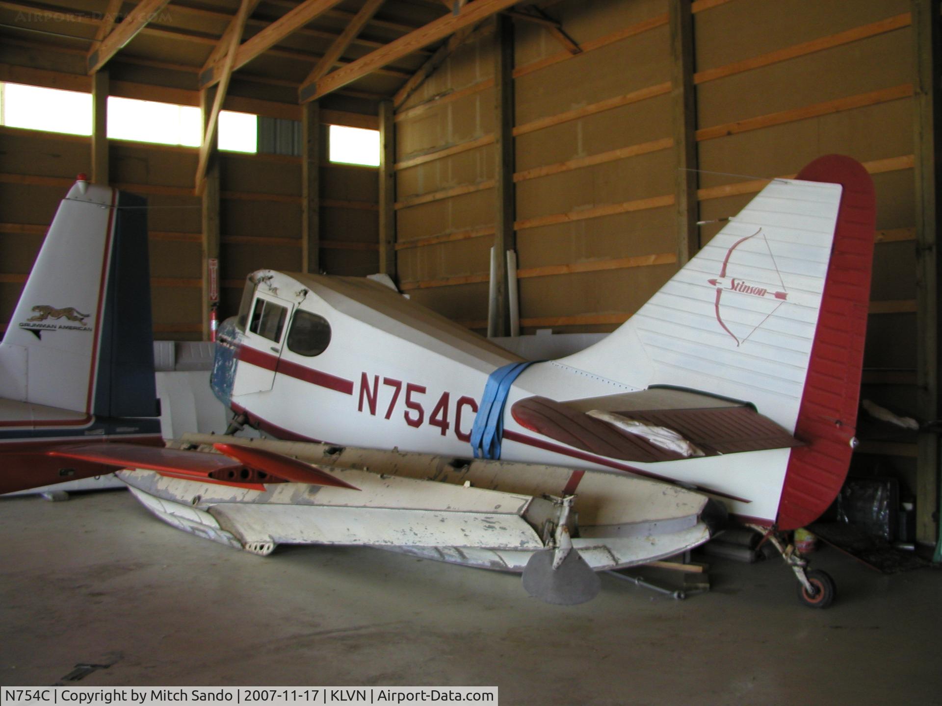 N754C, 1947 Stinson 108-3 Voyager C/N 108-3754, Parked inside the hangar.