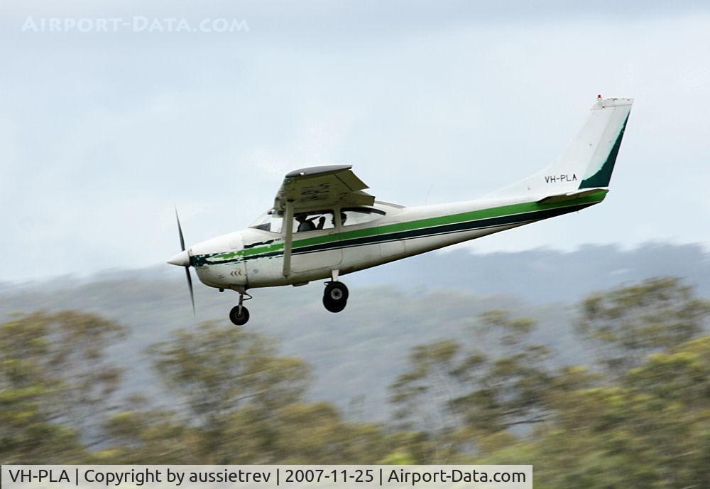 VH-PLA, 1965 Cessna 182H Skylane C/N 18256541, Skydiving school plane returning to the strip. Hope they maintain the insides better than they do the outside.