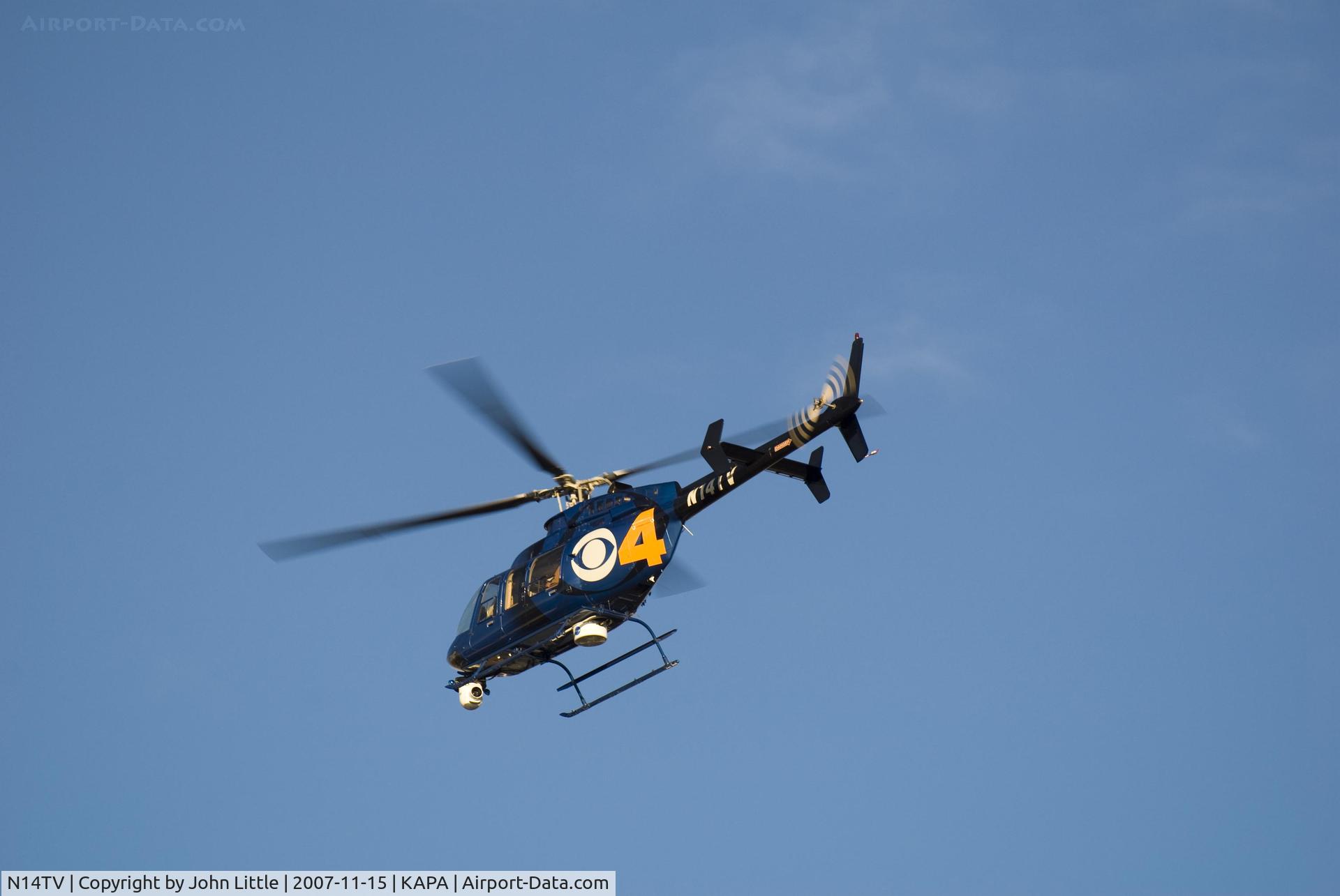 N14TV, 1996 Bell 407 C/N 53048, Local news chopper heading out of North Ramp