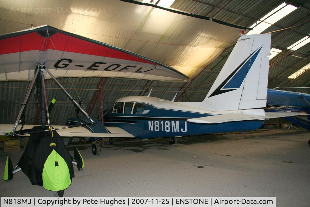 N818MJ, 1964 Piper PA-23-250 Aztec C/N 27-2486, N818MJ Aztec tucked in the hangar at Enstone