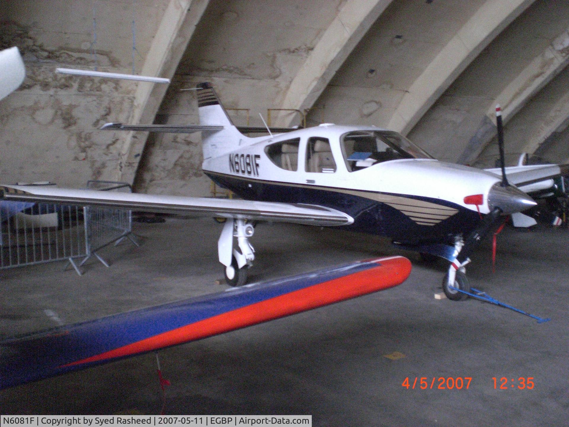 N6081F, 2001 Rockwell Commander 114-B C/N 14681, Commender Parked at the Delta Jets Hanger