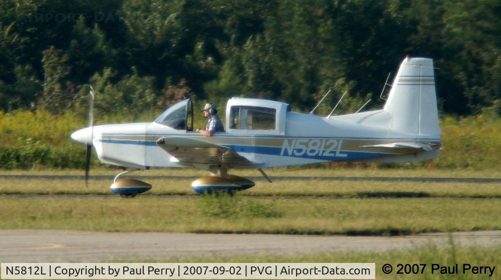 N5812L, 1971 American AA-5 C/N AA5-0012, Taxiing across field after the day's flying