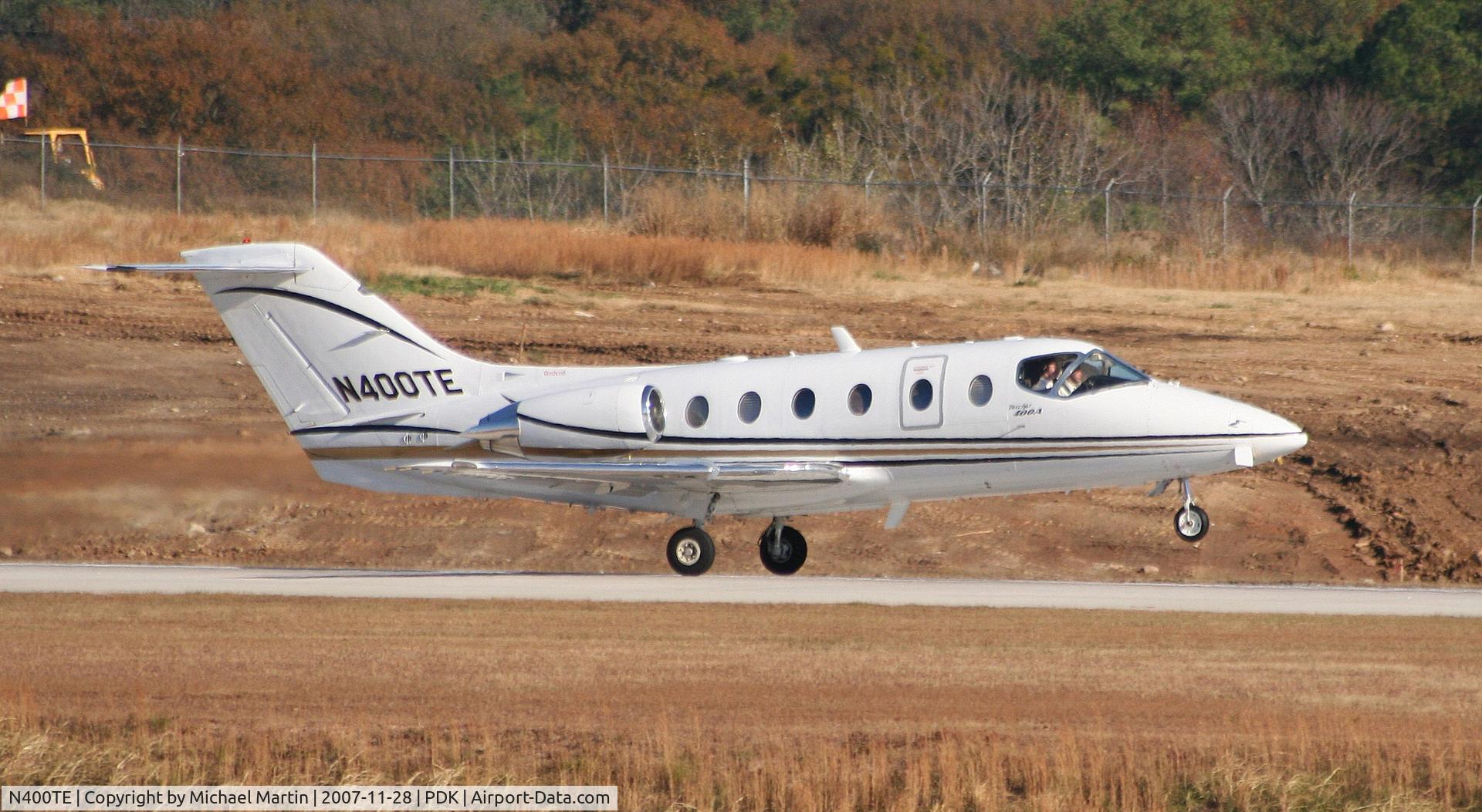 N400TE, 1998 Raytheon Beechjet 400A C/N RK-187, Taking off from Runway 20L