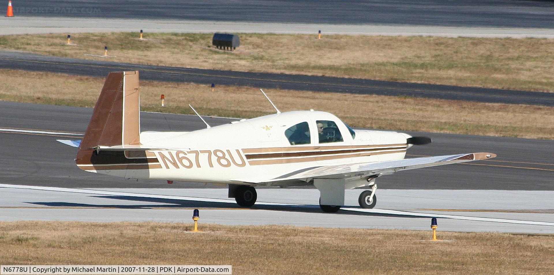 N6778U, 1963 Mooney M20C Ranger C/N 2500, Taxing to Run Up Area