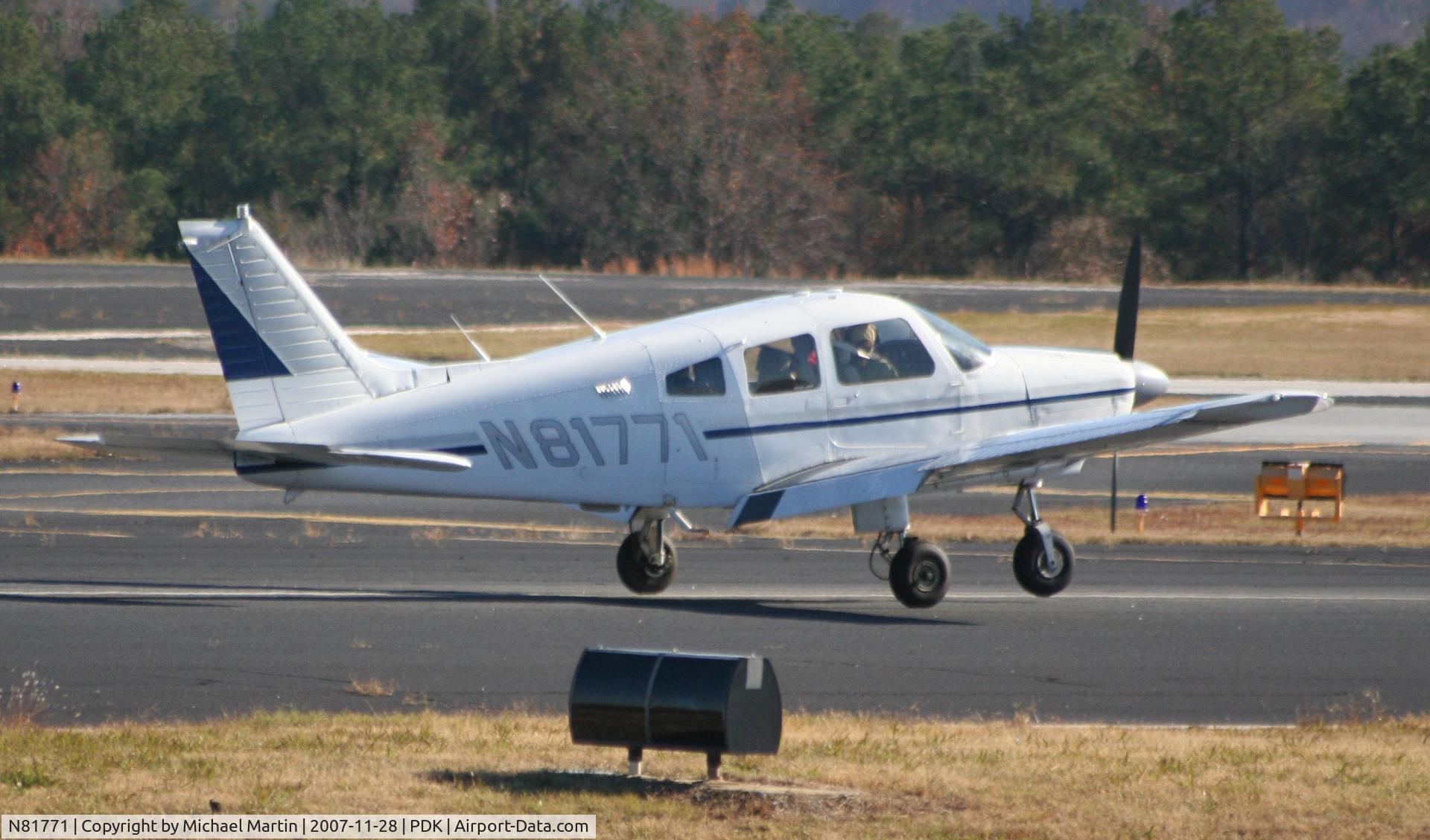 N81771, 1980 Piper PA-28-181 C/N 28-8090269, Taking off from Runway 20R