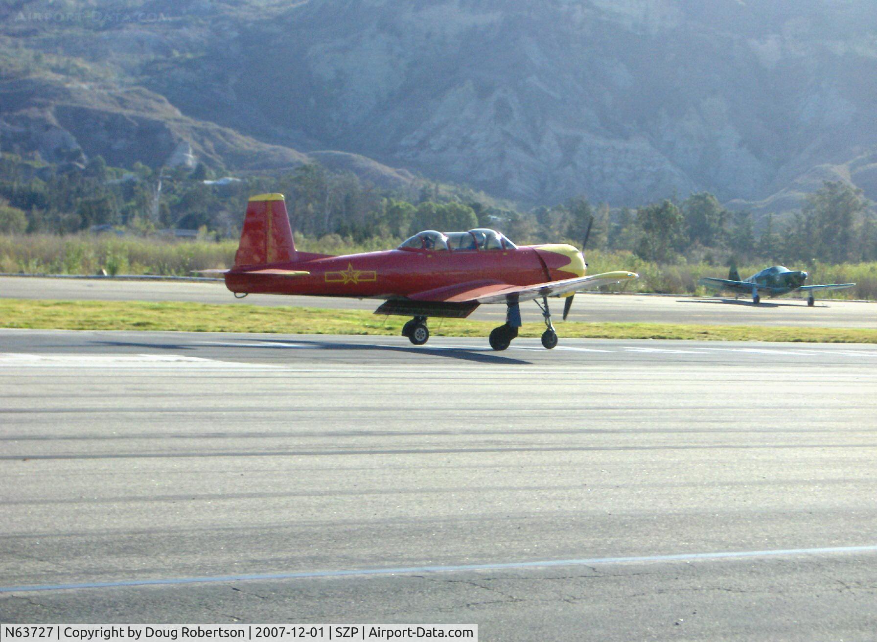 N63727, 1977 Nanchang CJ-6A C/N 1832035, 1977 Nanchang China CJ-6A as NX63727, Huosai 6A 9 cylinder radial 285 Hp, landing roll Rwy 22