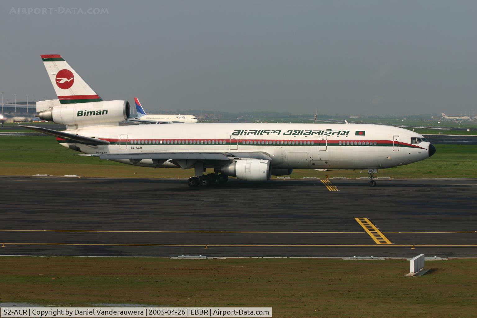 S2-ACR, 1988 McDonnell Douglas DC-10-30 C/N 48317, taxiing to take off on rwy 25R