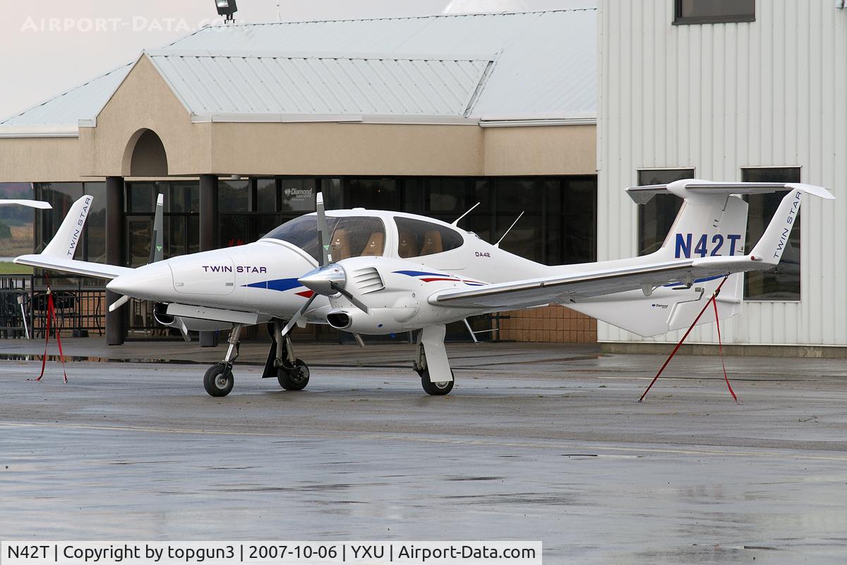 N42T, 2007 Diamond DA-42 Twin Star C/N 42.AC084, Parked by Diamond Flight Centre.