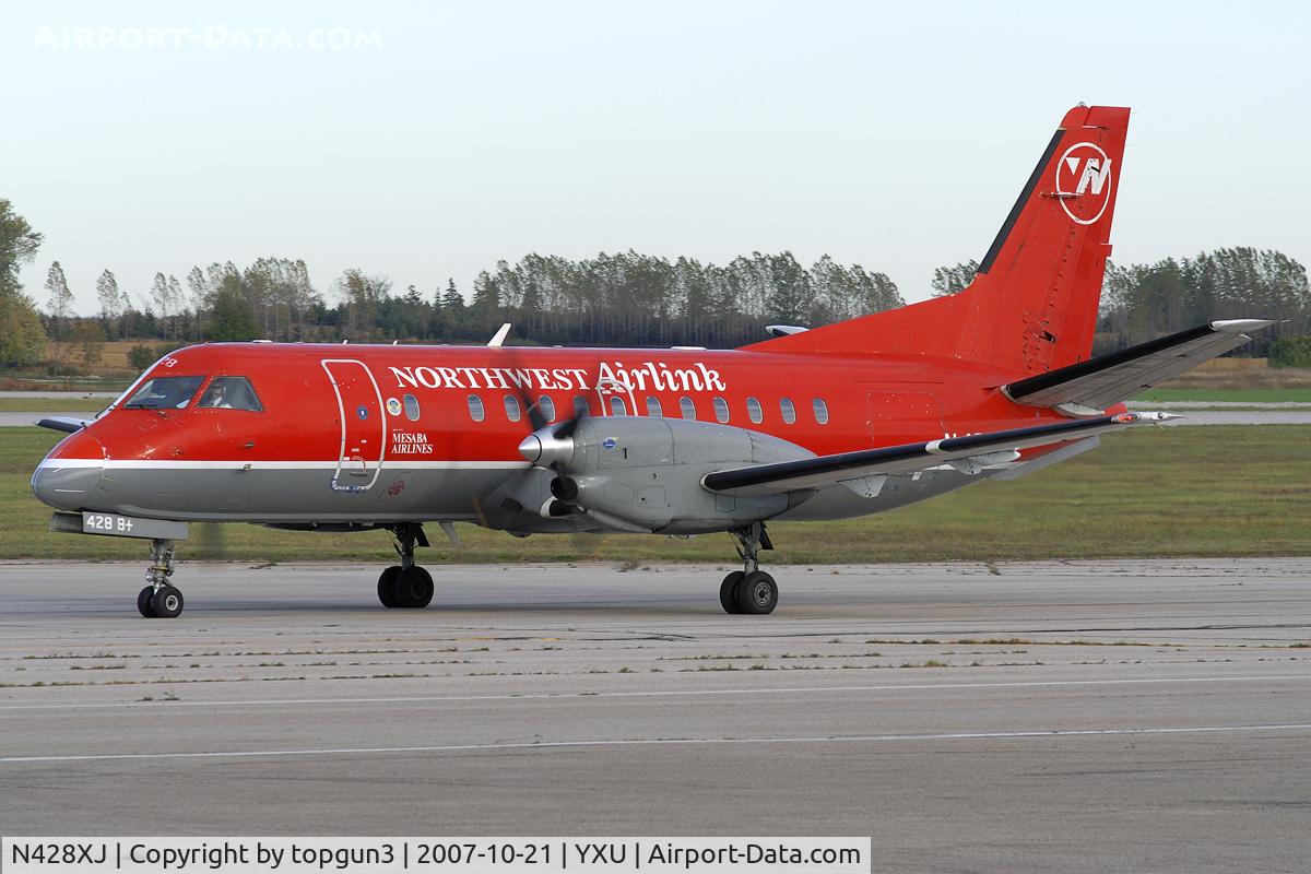 N428XJ, 1997 Saab 340B+ C/N 340B-428, Taxiing on Golf for departure.