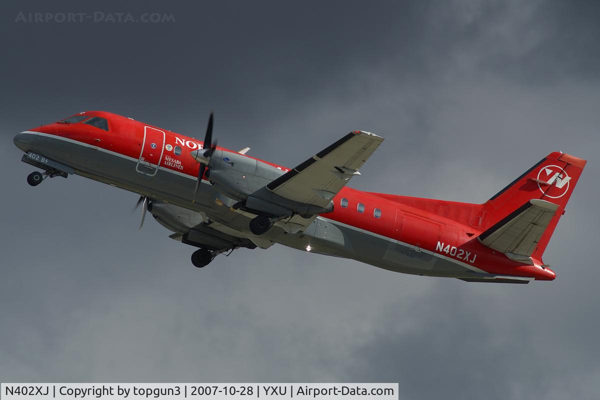 N402XJ, 1996 Saab 340B+ C/N 340B-402, Departing RWY33.