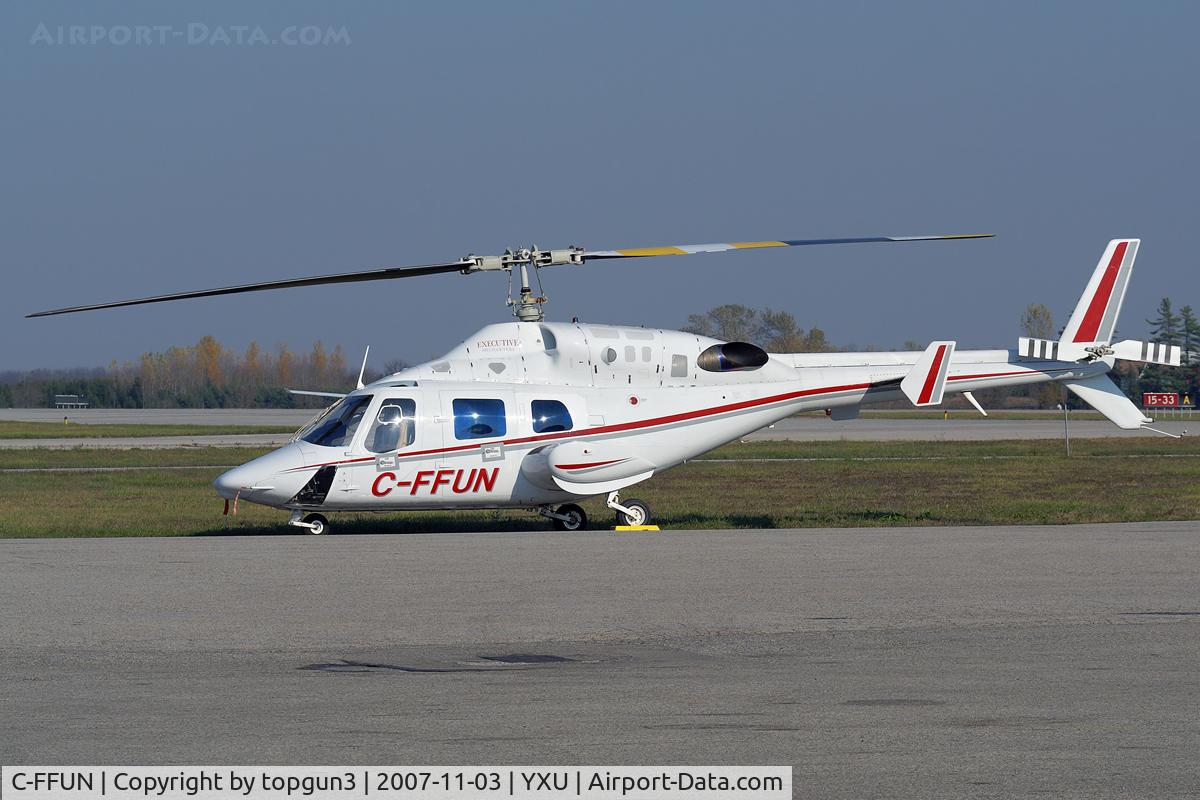 C-FFUN, Bell 222B C/N 47146, Parked by ESSO ramp.