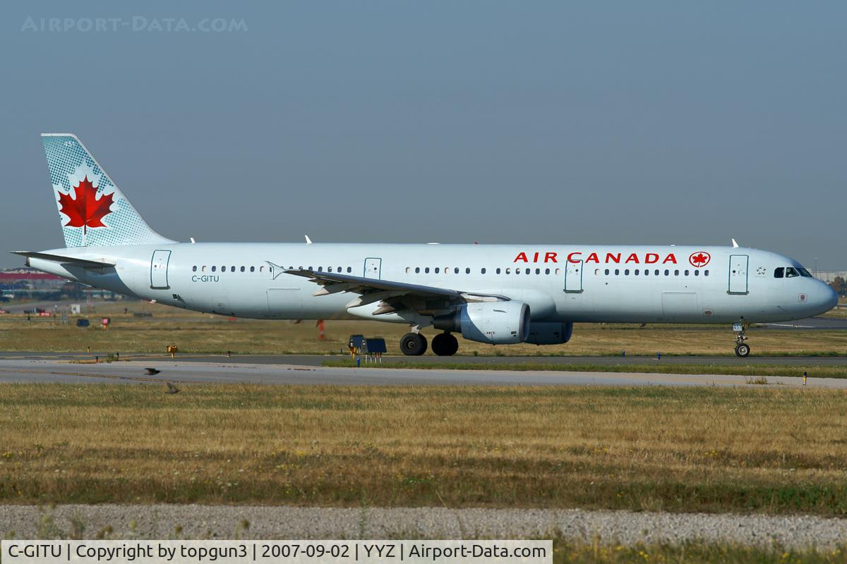 C-GITU, 2001 Airbus A321-211 C/N 1602, Taxiing for departure via RWY23.