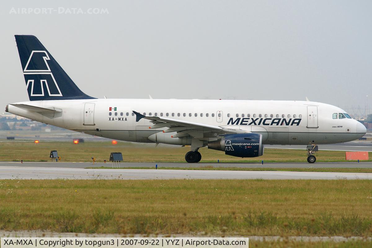 XA-MXA, 2004 Airbus A319-112 C/N 2078, Taxiing for departure via RWY23.