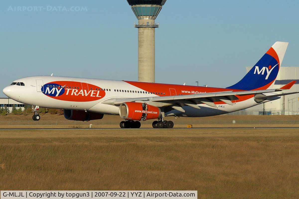G-MLJL, 1999 Airbus A330-243 C/N 254, Landing on RWY33L.