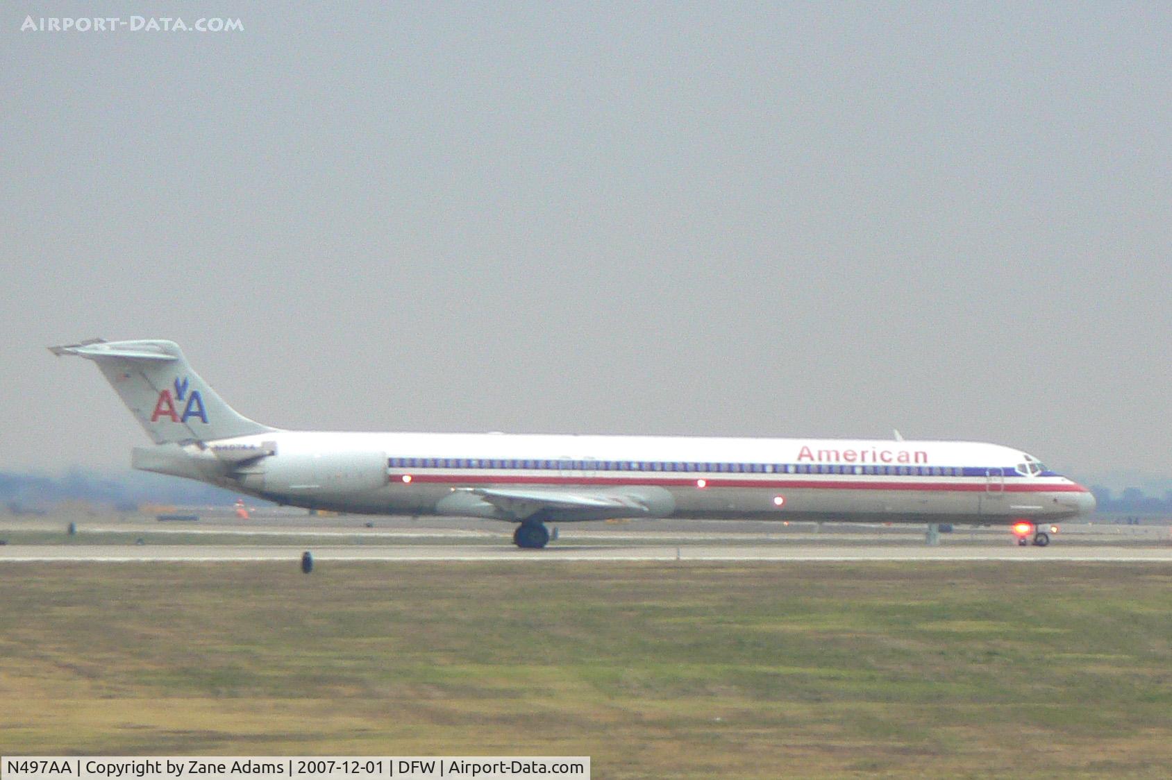 N497AA, 1989 McDonnell Douglas MD-82 (DC-9-82) C/N 49735, Rainy day at DFW - Holding short 18L