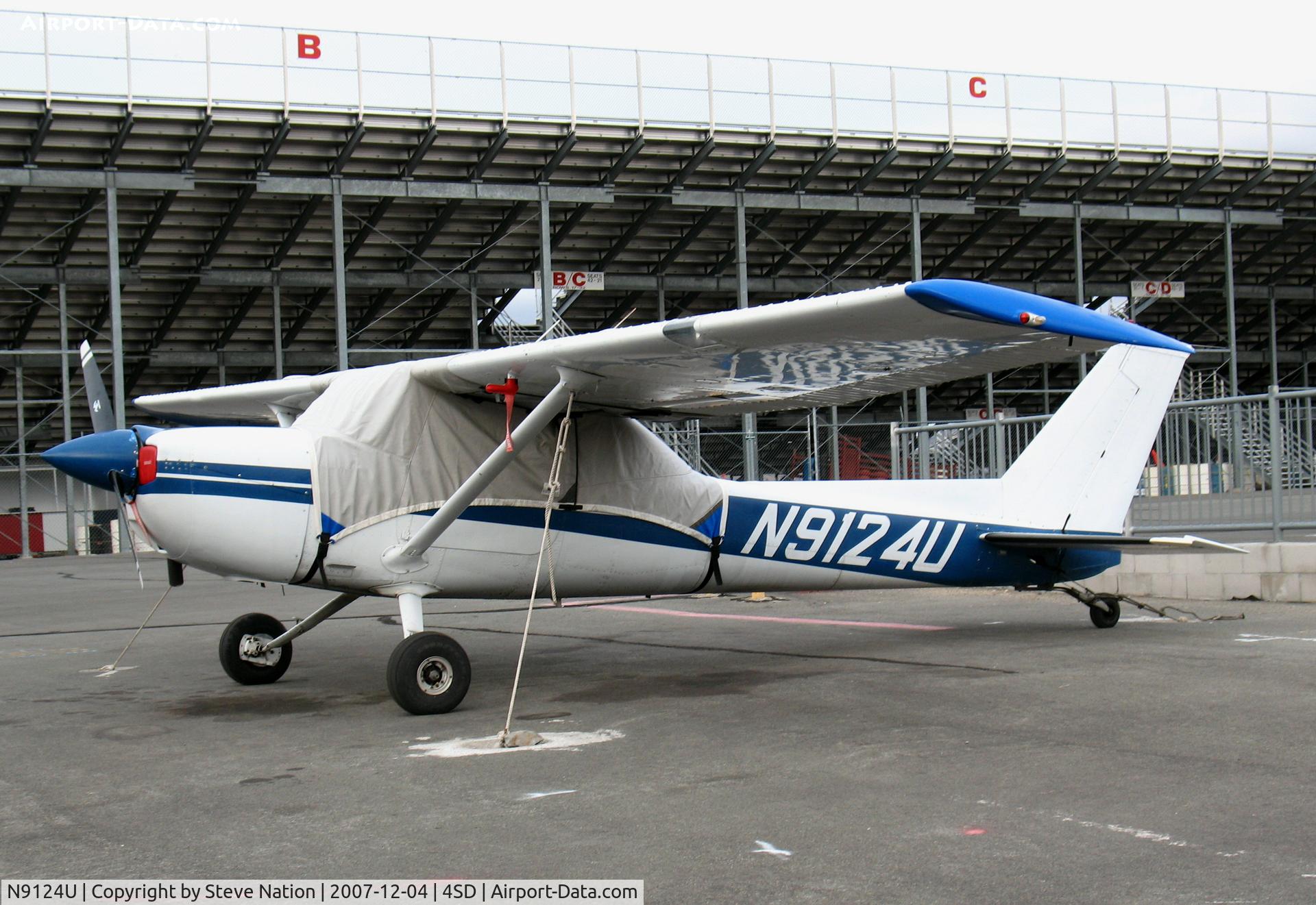 N9124U, 1976 Cessna 150M C/N 15078075, 1976 tail-dragger Cessna 150M with cover @ Reno-Stead
