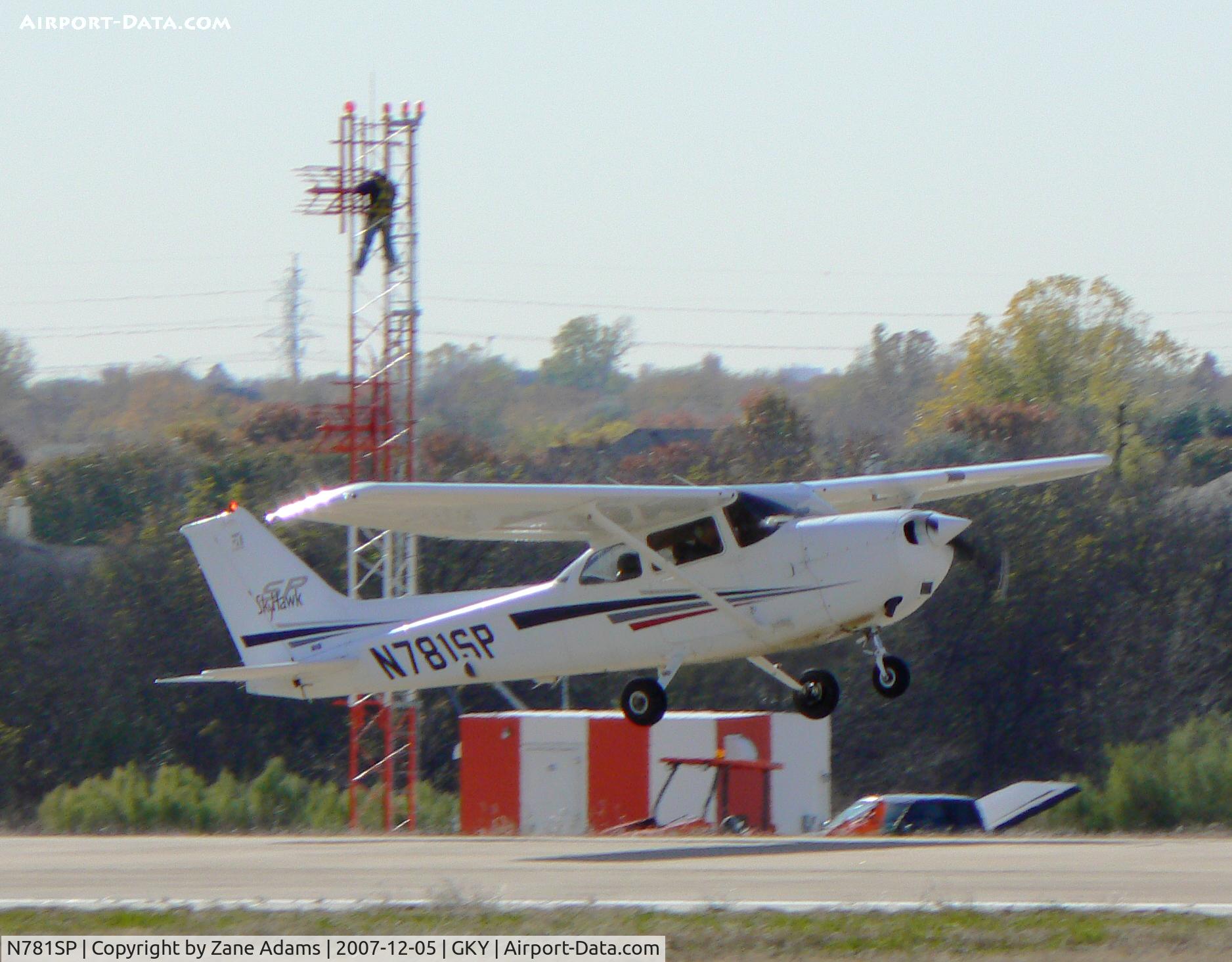 N781SP, 2001 Cessna 172S C/N 172S8709, Flight training - Take off at Arlington Municipal - Is that sasquatch working on the ILS?