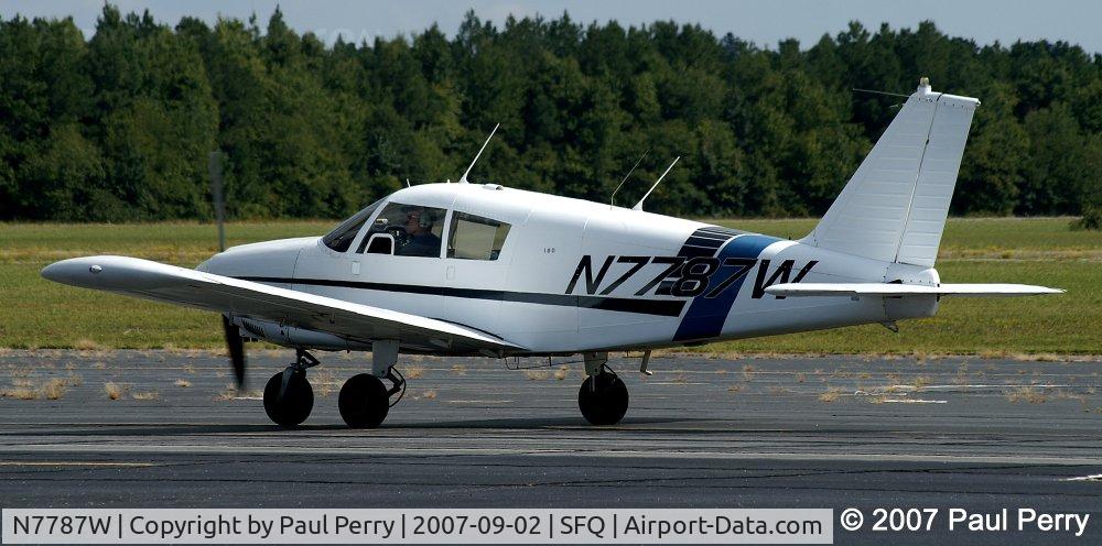 N7787W, 1964 Piper PA-28-180 Cherokee C/N 28-1796, Nice colors, as she taxis on by