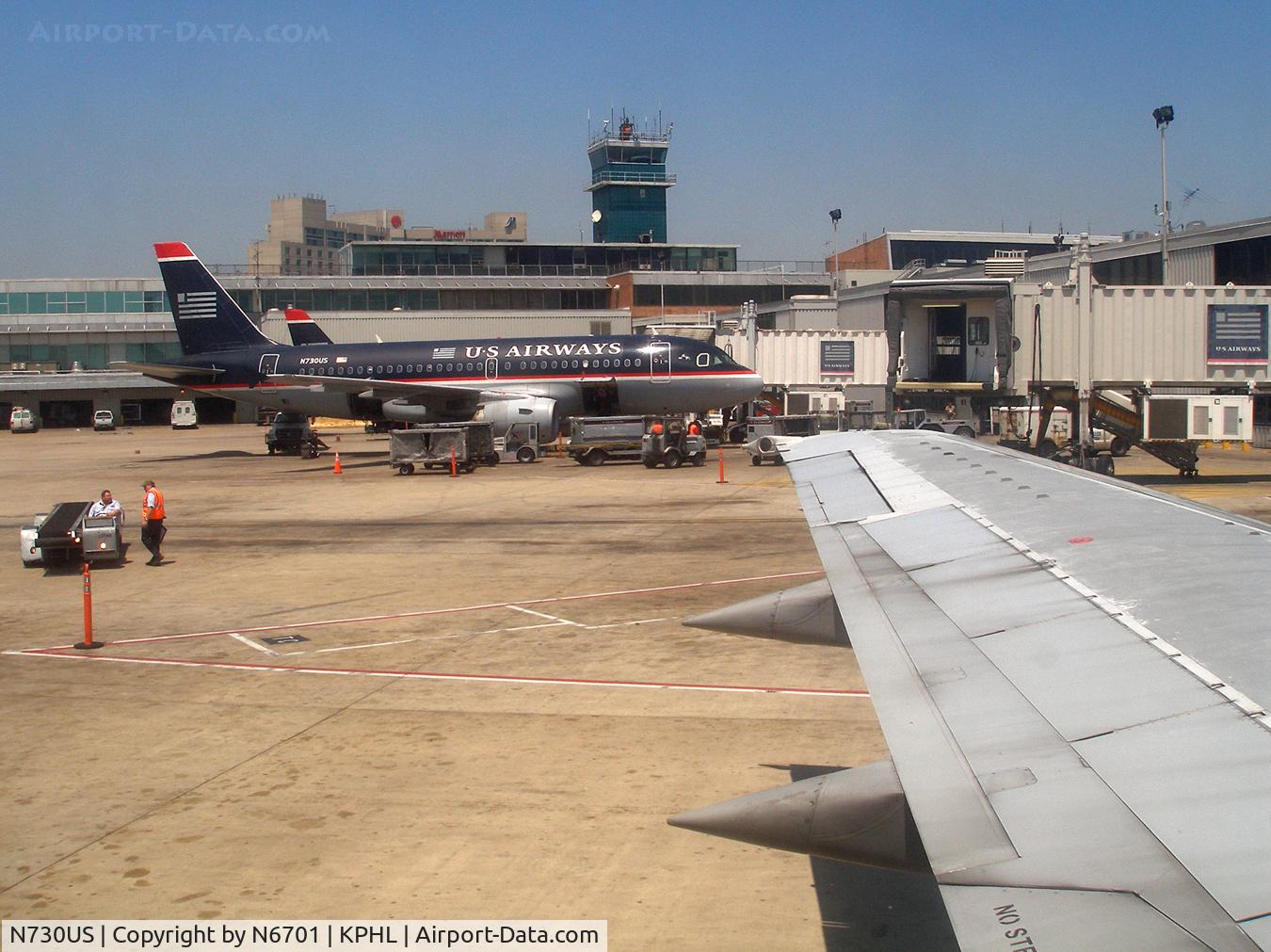 N730US, 2000 Airbus A319-112 C/N 1182, Parked next to the US 737 I am on bound for TPA.