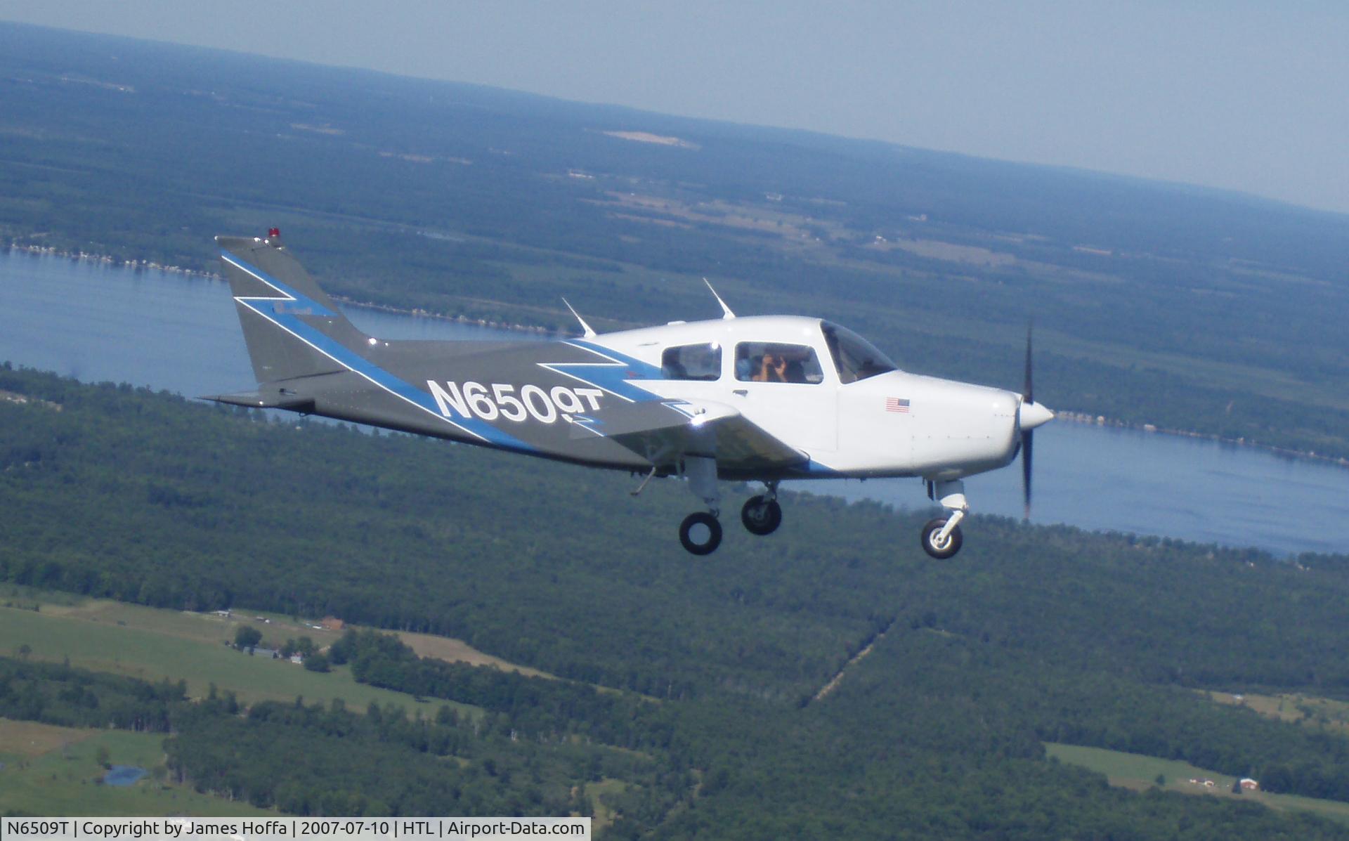 N6509T, 1968 Beech 19A C/N MB-349, Jim took this during our flight to Mackinaw in July 2007